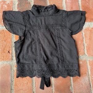 black lace blouse is a Francesca's Collections